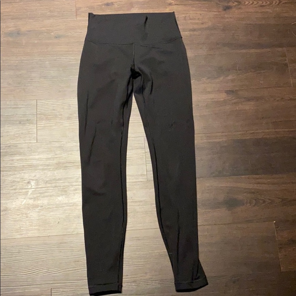 Black classic mid rise lululemon wonderunders.
